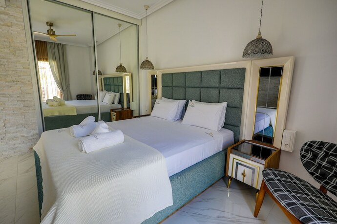 Imagen de la habitación del Beach Walk Luxury Suites. Foto 16