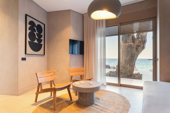 Imagen de la habitación del Beau Rivage Suites. Foto 8