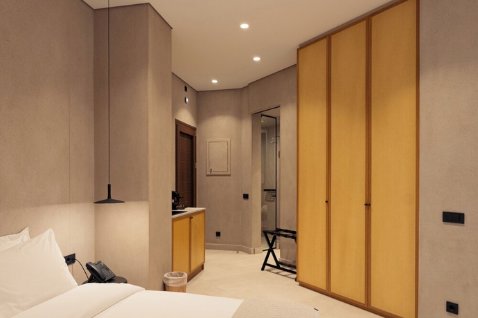 Imagen de la habitación del Beau Rivage Suites. Foto 9