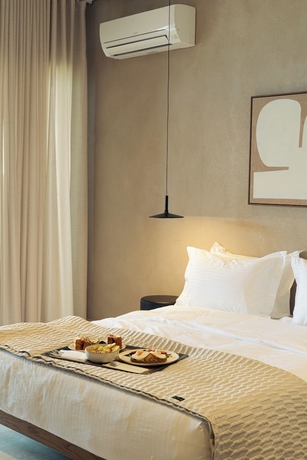 Imagen de la habitación del Beau Rivage Suites. Foto 12