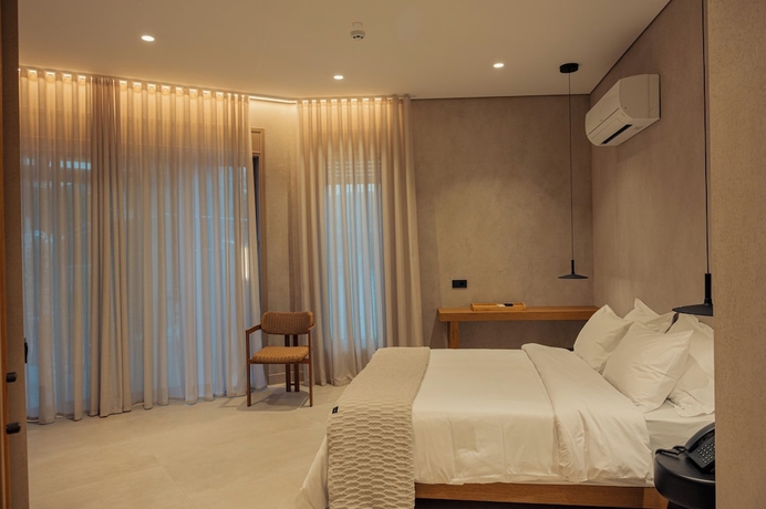 Imagen de la habitación del Beau Rivage Suites. Foto 13