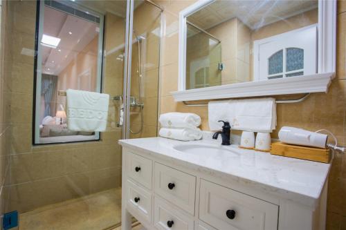 Imagen general del Bedom Apartment · Wuyue Plaza Of Qingdao Petroleum. Foto 1