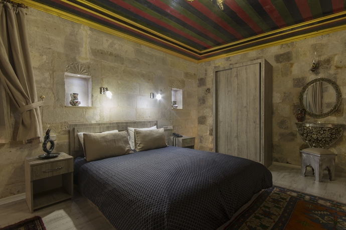 Imagen de la habitación del Bedrock Cave Hotel - Adults Only. Foto 9