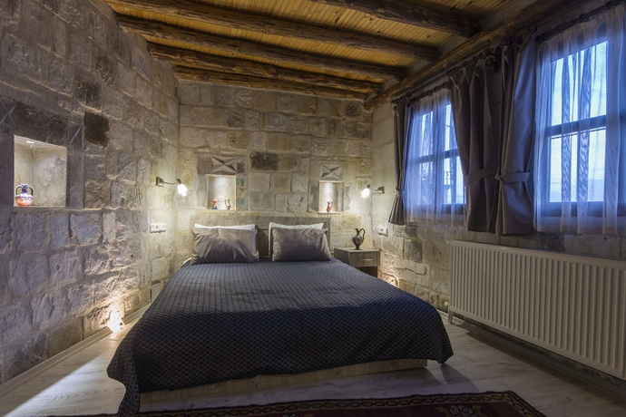 Imagen de la habitación del Bedrock Cave Hotel - Adults Only. Foto 10