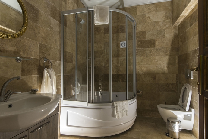 Imagen de la habitación del Bedrock Cave Hotel - Adults Only. Foto 16