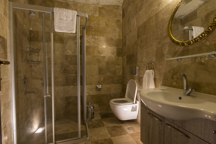 Imagen de la habitación del Bedrock Cave Hotel - Adults Only. Foto 19