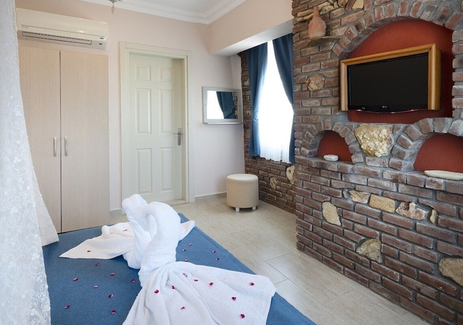 Imagen de la habitación del Begonvil Hotel Bozcaada. Foto 13