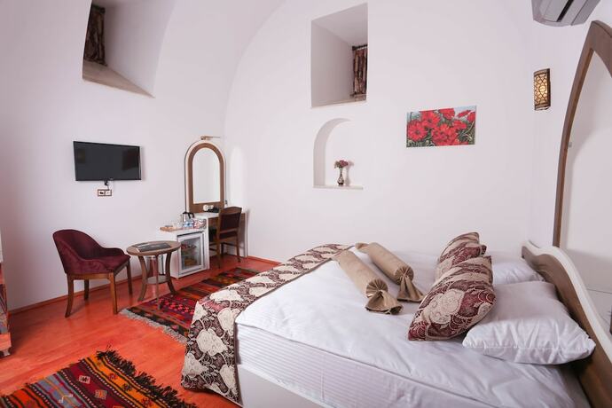 Imagen de la habitación del Behrampasa Otel. Foto 16