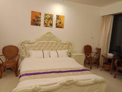 Imagen de la habitación del Beibuwan Yihao Jingxuan Sea View Apartment. Foto 6