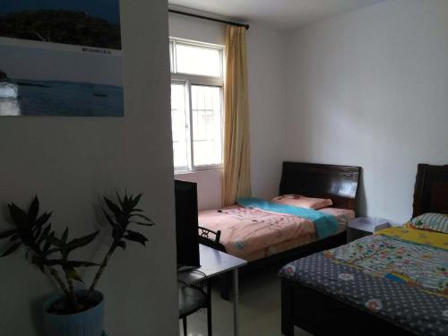 Imagen de la habitación del Beihai Old Town Holiday Seaview Inn. Foto 4