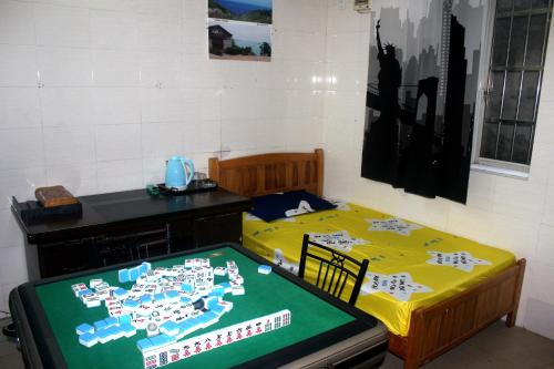 Imagen de la habitación del Beihai Old Town Holiday Seaview Inn. Foto 7