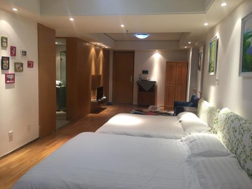 Imagen de la habitación del Beijing Tiandi Huadian Hotel Apartment (qilinshe B. Foto 9