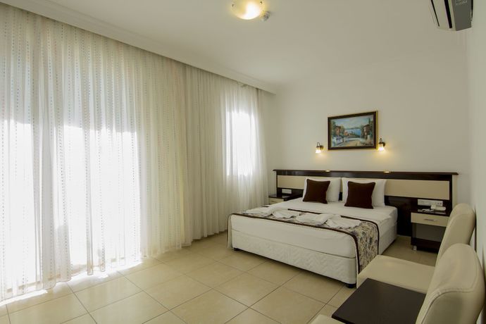 Imagen de la habitación del Belcekum Beach Hotel. Foto 16