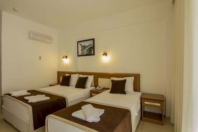 Imagen de la habitación del Belcekum Beach Hotel. Foto 17