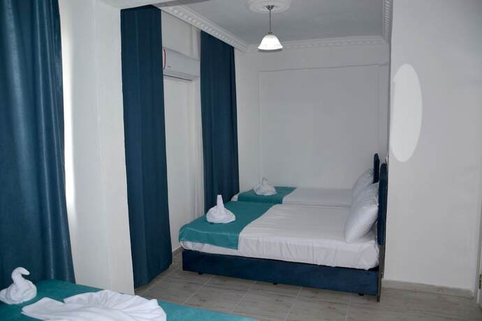 Imagen de la habitación del Belek Gold Pansiyon. Foto 17