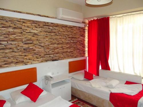 Imagen de la habitación del Belgin Otel. Foto 7