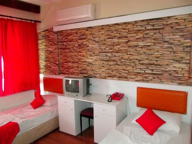 Imagen de la habitación del Belgin Otel. Foto 17