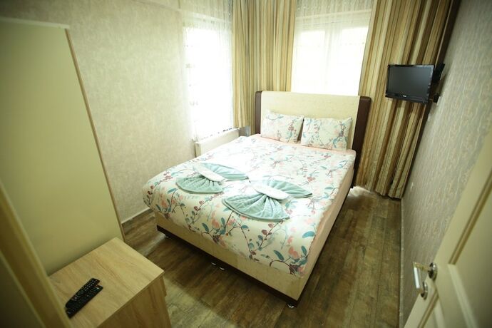Imagen de la habitación del Bella Suit Konaklama. Foto 15