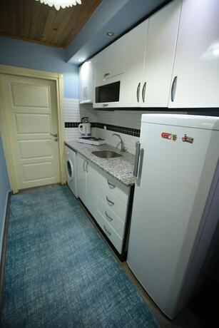 Imagen de la habitación del Bella Suit Konaklama. Foto 17