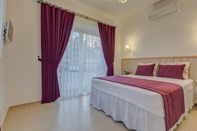 Imagen de la habitación del Bella pietra otel. Foto 2