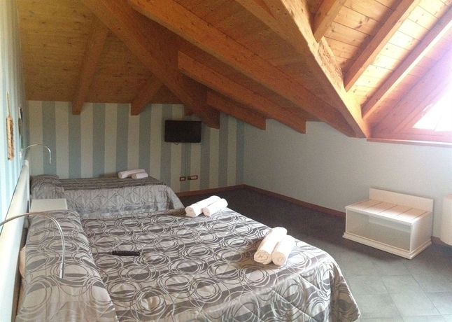 Imagen de la habitación del Bergamo Infinita. Foto 13