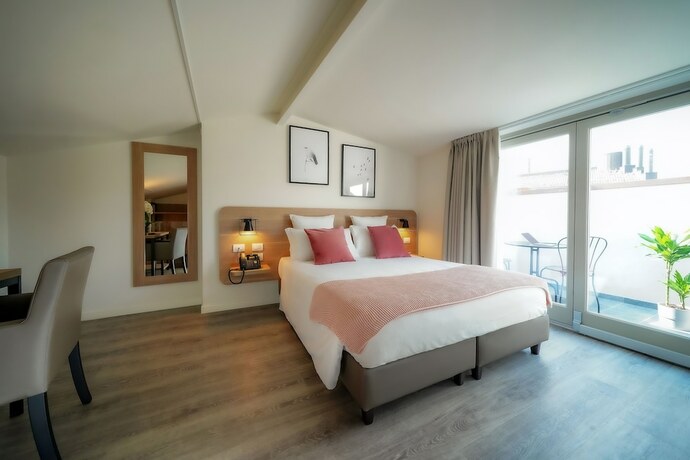 Imagen de la habitación del Bergamo Inn 15. Foto 13