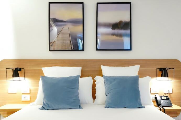 Imagen de la habitación del Bergamo Inn 15. Foto 19