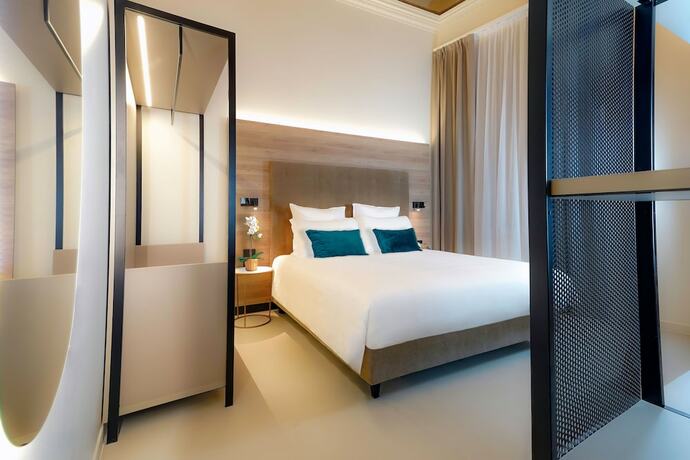 Imagen de la habitación del Bergamo Inn 21. Foto 13