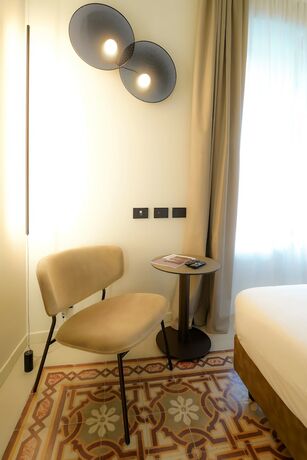 Imagen de la habitación del Bergamo Inn 21. Foto 14