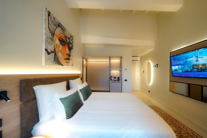 Imagen de la habitación del Bergamo Inn 21. Foto 17