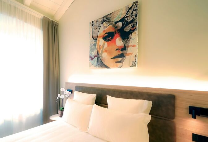 Imagen de la habitación del Bergamo Inn 21. Foto 19