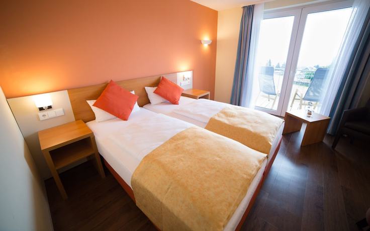Imagen de la habitación del Berghotel Tambach Seminar Center. Foto 6