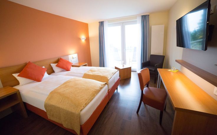 Imagen de la habitación del Berghotel Tambach Seminar Center. Foto 8