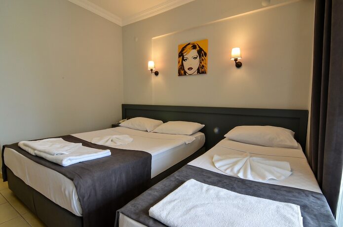 Imagen de la habitación del Berry Bella Hotel. Foto 15