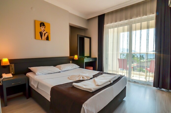 Imagen de la habitación del Berry Bella Hotel. Foto 19