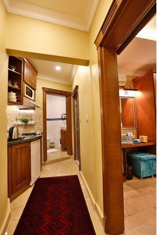 Imagen de la habitación del Best Point Suites. Foto 12