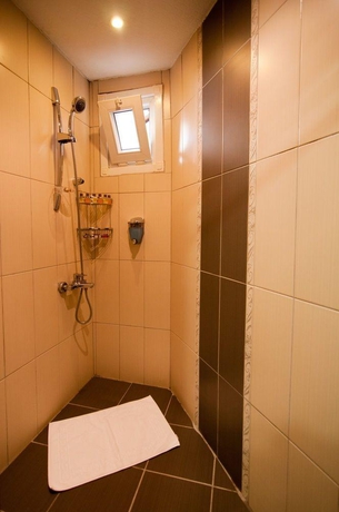 Imagen de la habitación del Best Point Suites. Foto 13