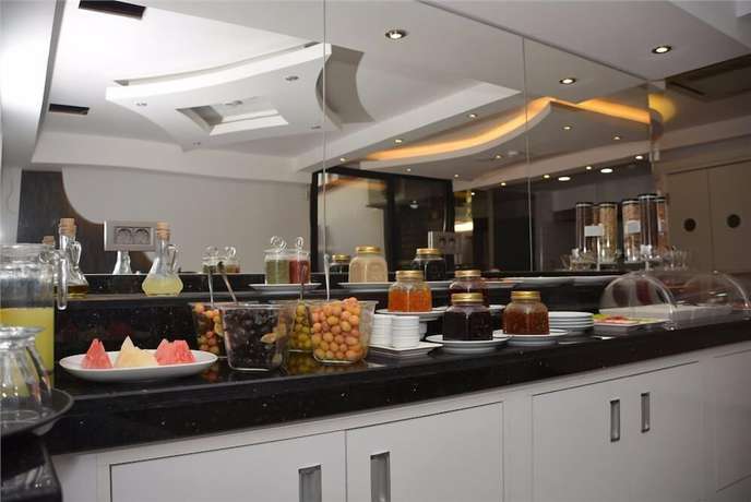 Imagen del bar/restaurante del Best Smyrna Hotel, Kusadasi. Foto 2