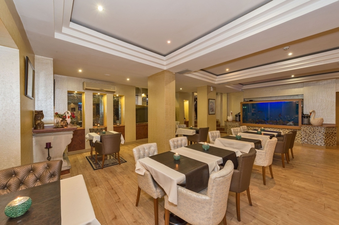 Imagen del bar/restaurante del Beyaz Kuğu Hotel. Foto 4