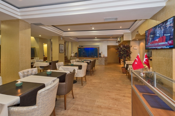 Imagen del bar/restaurante del Beyaz Kuğu Hotel. Foto 6