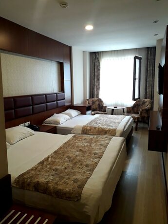 Imagen de la habitación del Beyaz Saray Hotel. Foto 16