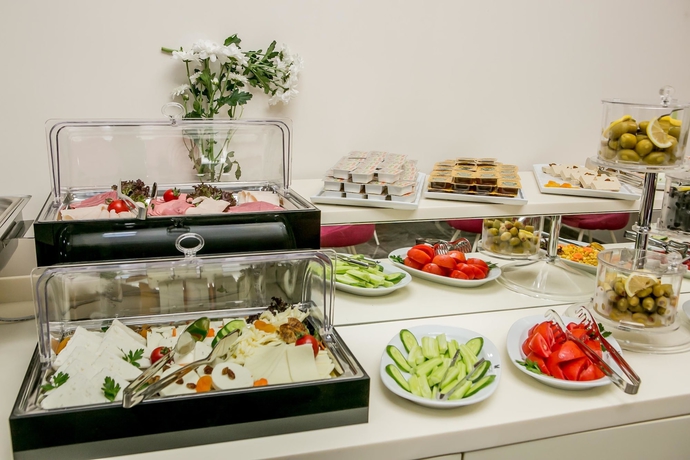 Imagen del bar/restaurante del Beyzas Hotel and Suites. Foto 12