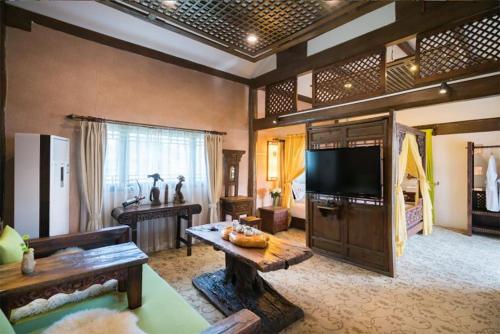 Imagen de la habitación del Big Tree Guesthouse - Naxi old style. Foto 12