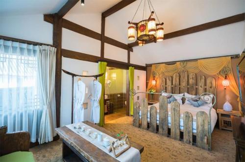 Imagen de la habitación del Big Tree Guesthouse - Naxi old style. Foto 13