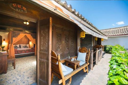 Imagen de la habitación del Big Tree Guesthouse - Naxi old style. Foto 15