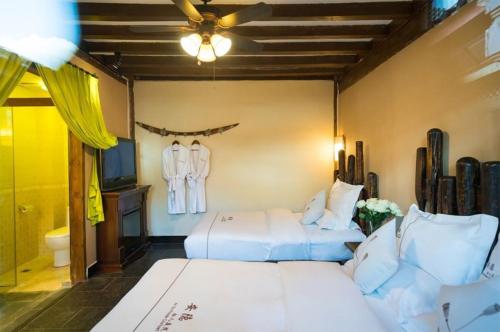 Imagen general del Big Tree Guesthouse - Naxi old style. Foto 3