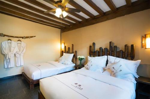 Imagen de la habitación del Big Tree Guesthouse - Naxi old style. Foto 16
