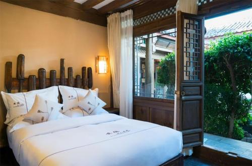 Imagen general del Big Tree Guesthouse - Naxi old style. Foto 4