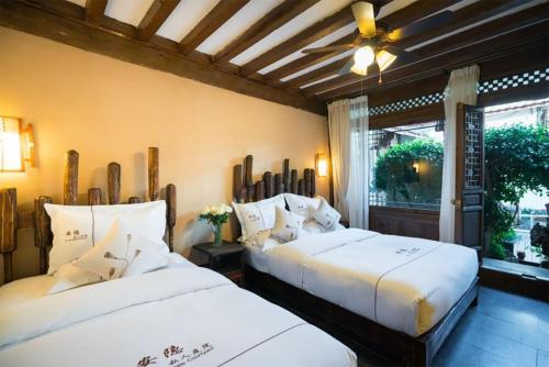 Imagen general del Big Tree Guesthouse - Naxi old style. Foto 5