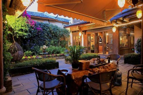 Imagen general del Big Tree Guesthouse - Naxi old style. Foto 7